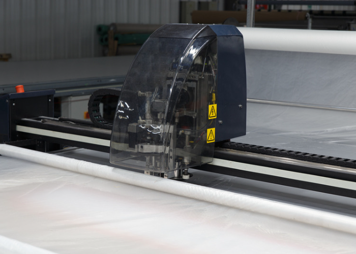 taglio automatico cad cam per tessuti per produzione abbigliamento conto terzi di Mdesign